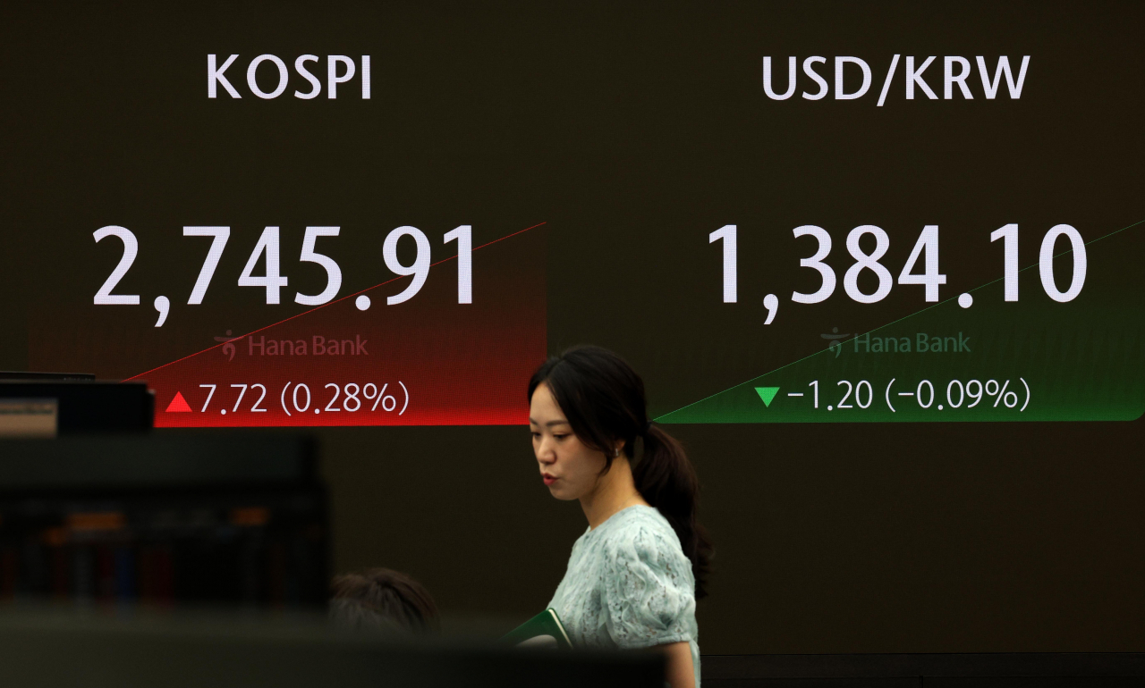 Seoul shares open higher on rate cut hopes