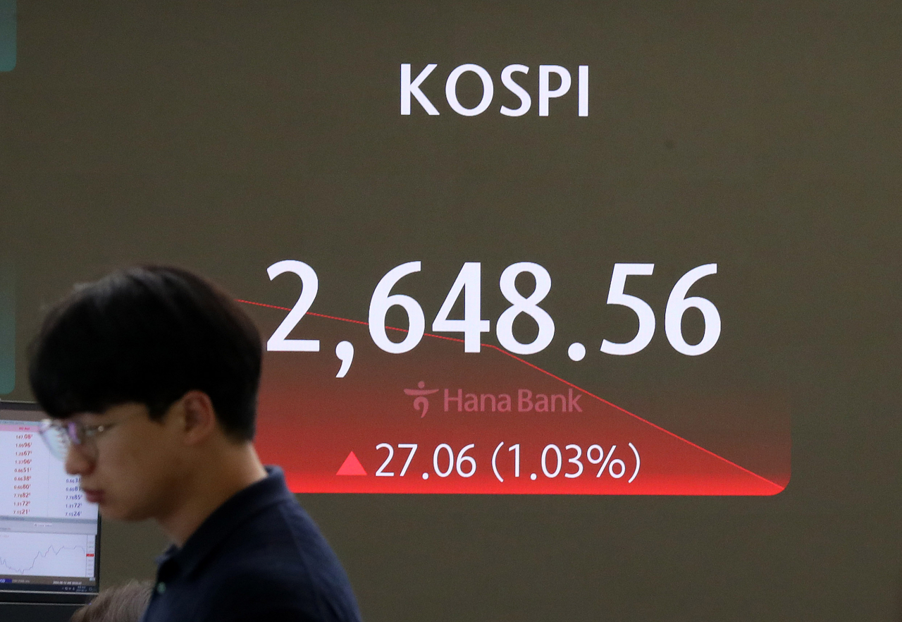 Seoul shares open higher on Wall Street gains