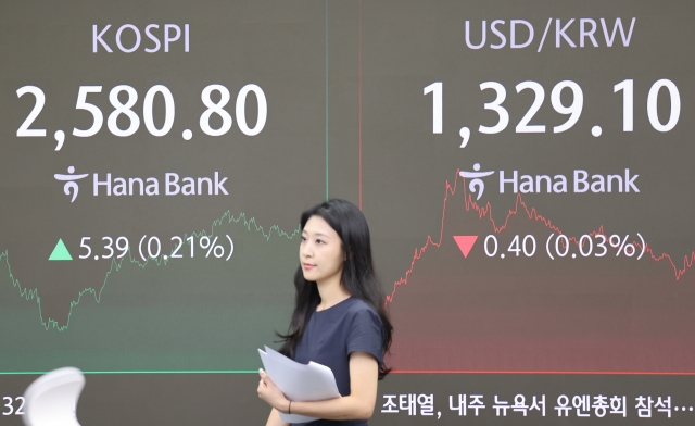 Seoul shares end higher after Fed's rate cut